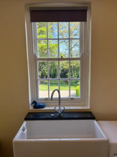 Skats, Hall Cottage & gardens, & hard tennis court, Wighill, nr York and Leeds in Wighill