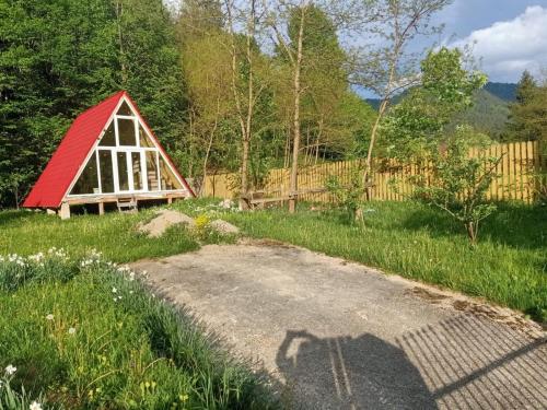 Dārzs, Red Chalet in Schitu Tarcău