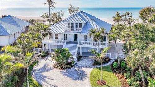 Stunning Beachfront Villa with Heated Pool