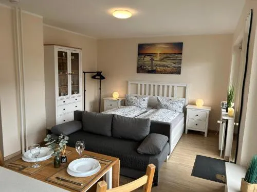 Ferienwohnung Ritthoff Perlebucht - mit Strandkorb am Meer und kostenloser Eintritt ins Schwimmbad in Büsum, Deutschland