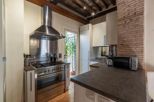 GuestHost - Stunning Apartment in Trastevere, Roma (foto 3)