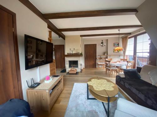 Koplietošanas atpūtas telpa ar TV, Apartment Tiffany in Nowe Bystre