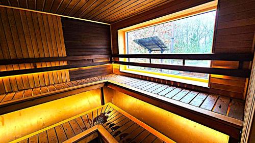 Sauna, Atostogu namas su baseinu, jacuzzi ir pirtimi in Sendvario