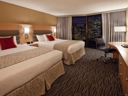 Deluxe Queen Room with Two Queen Beds image 2