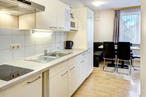 Cocina, Appartement Alpensee in Zell Am See