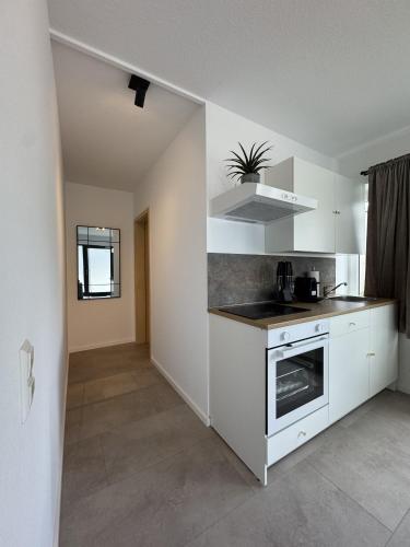 keuken, FILDER quartett Apartmenthotel in Filderstadt