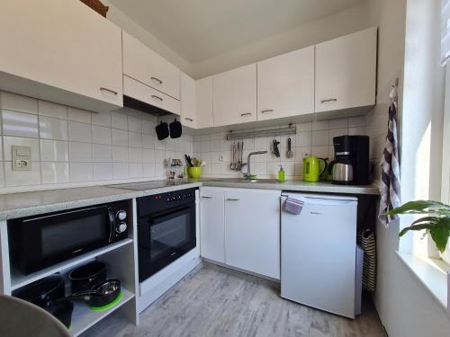 Køkken, Anjas Ferienwohnung in Syke-am Bahnhof, zentral aber ruhig, 2 Zimmer, Terrasse, Parkplatz, Bremen nu in Syke
