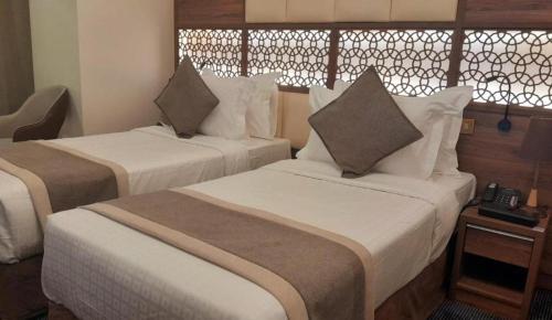 Chambre avec 2 lits, king, vue sur le haram