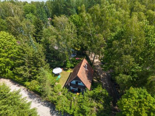 Зовнішній вигляд готелю, Domek nad jeziorem in Мораг