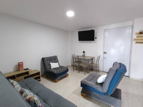 Apartamento de 5 estrellas cerca del aeropuerto, Wifi, cowork en Bogotá
