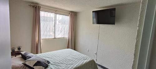 Habitación con servicos de TV premuim