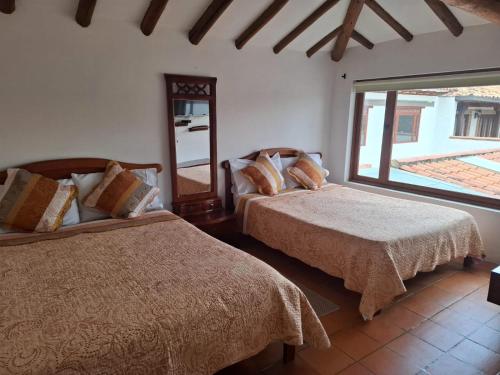Quadruple Room with Garden View room in Hotel Villa Paz