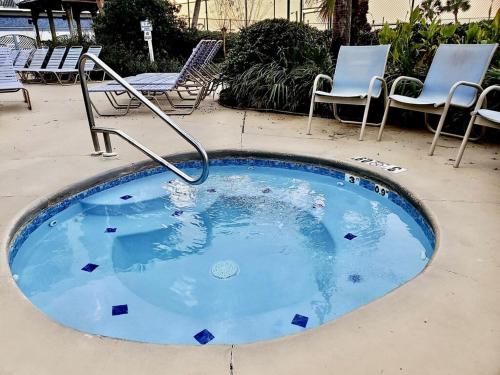 Piscina, Gulf Shores Surf and Racquet Club Unit 406C in Costas do Golfo (AL)