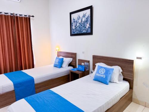 Adiputra Guesthouse Homiq in Godean