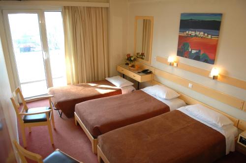 Chambre triple, 3 lits