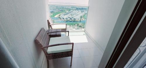 Sky-High Comfort 1BR in Carson Tower Damac Hills - image 12