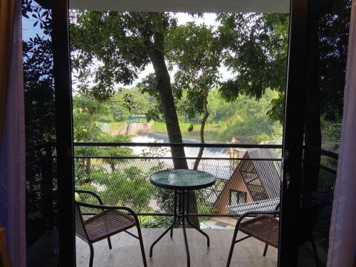 Vaade, Krasan Riverside Resort Jogja near Hutan Pinus Bukit Becici