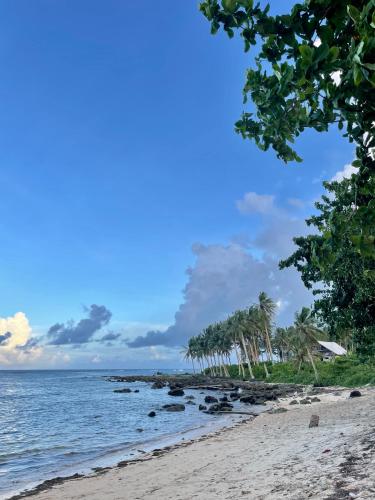 Praia, Sun & Surf Hostel - STARLINK in Siargao Island
