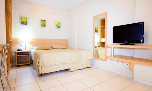 Flat com Piscinas Termais e Área de Lazer Completa