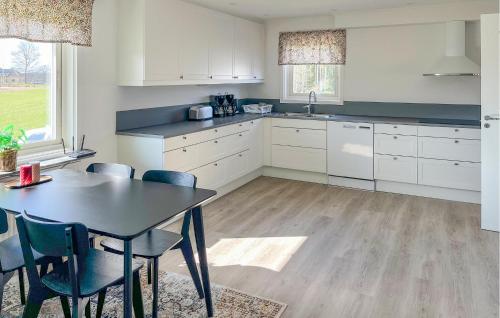 Kitchen, Amazing Home In Bolmso With Sauna in Bolmso