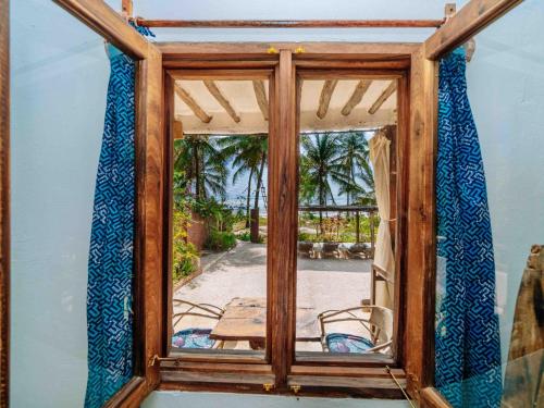 Vistas, Shanuo Beach Bungalows in Michamvi