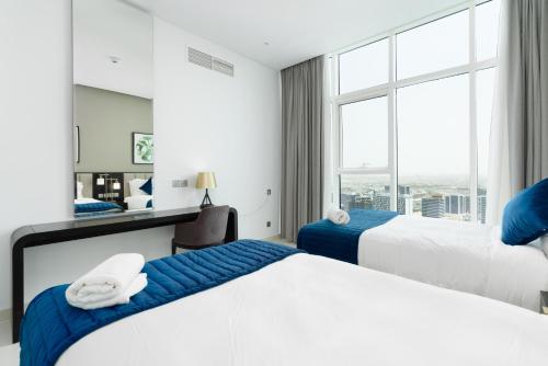BellaViu Holiday Homes-From City Rush to Calm -2BR Retreat in DAMAC Prive, Dubaï (photo 3)