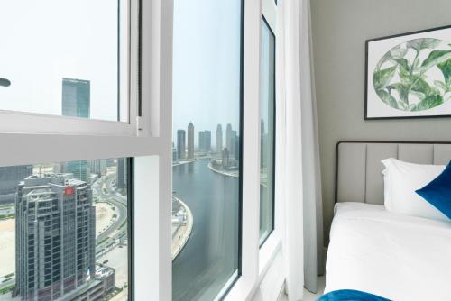 BellaViu Holiday Homes-From City Rush to Calm -2BR Retreat in DAMAC Prive, Dubaï (photo 7)