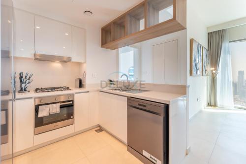 2BR Apartment Walking Distance to Dubai Mall, Downtown Views II, Downtown by Deluxe Holiday Homes, Dubaj (fotografie 5)