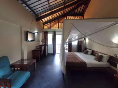 Hôtel de la Palmeraie (Hotel de la Palmeraie) in Бужумбура