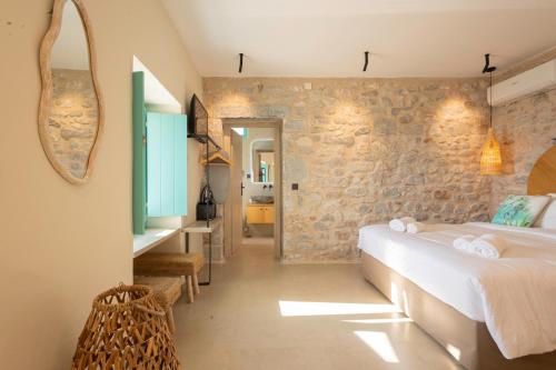 Paradise Can Wait Sophia Suites in Omales