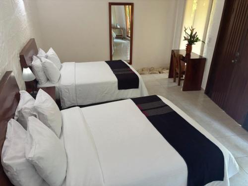 Hotel La Aldea del Halach Huinic Room Type - Double Room with Two Double Beds or One Large Bed Hotel La Aldea del Halach Huinic Room Type - Double Room with Two Double Beds or One Large Bed