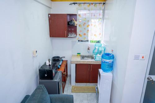 Studio Apartment Near Jsb Block A with hot shower in มอมบาซา