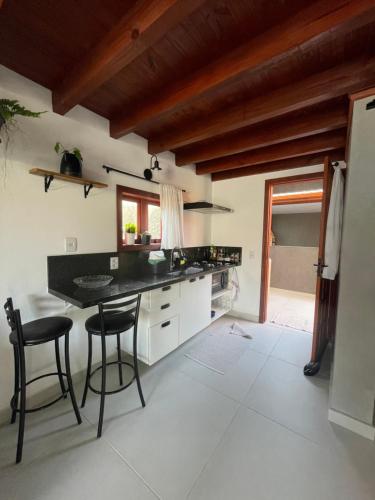 Chale aconchegante da ilha in São João do Rio Vermelho