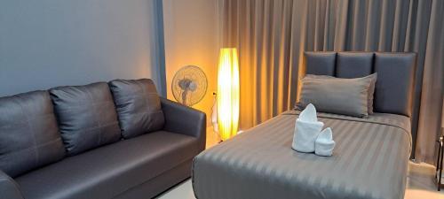 ラチャブリー โคซี่ โฮมสเตย์ 3つ星 ホテル スイート