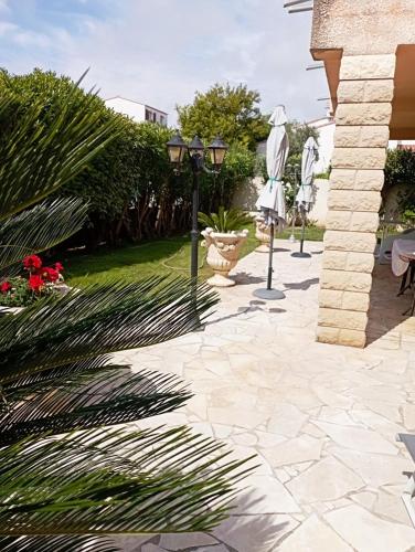 Garden, Baddha Konasana in Agde City Center
