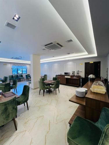 餐廳, Al Omara Plaza Hotel in 馬安