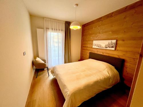 New apartment, in the heart of Les Gets with balcony, next to slopes and shops, sauna, gym and parking