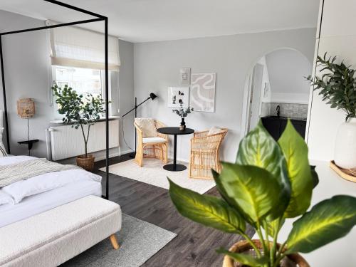 Seaside Rooms - Design-Apartment mit Balkon & Parkplatz - inklusive Strandkorb direkt am Wasser in Büsum, Deutschland