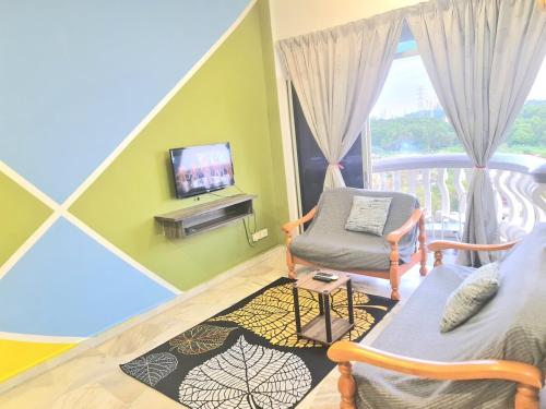 Sweet home Glory beach resort Wi-Fi Netflix|Free-p in Taman Tuah Batu