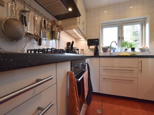 Kitchen, Spacious holiday home near with sauna in Garderen