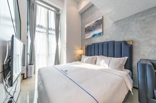 Queen Room with Two Queen Beds room in Zun Xiang Executive Apartment