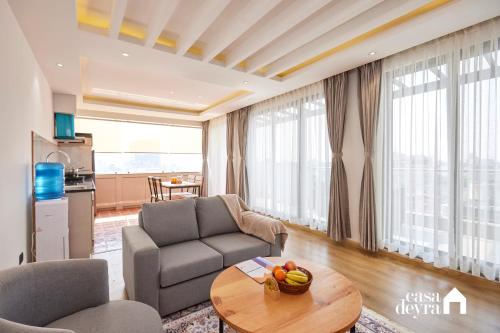 One-Bedroom Apartment with Balcony and City View