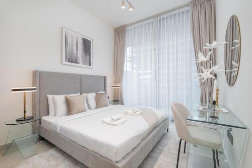Stylish 1BHK by CzechIn Pool & Gym Prime JVC, Dubaj