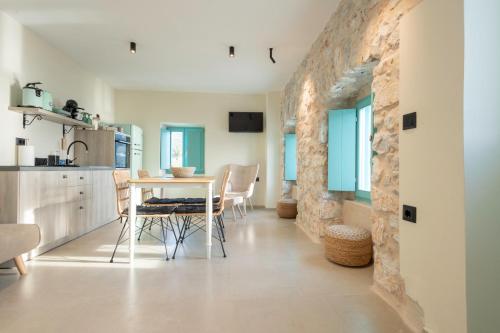 Paradise Can Wait Sophia Suites in Omales
