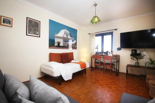 ห้องส่วนกลางสำหรับนั่งเล่น/ดูทีวี, Prime Oceanfront Apartment in หาดเซาเซบาสเตียว