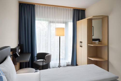 Four Points Flex by Sheraton Koblenz - Tap to explore photos