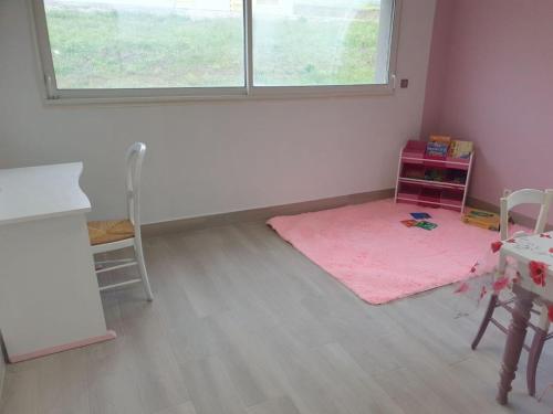 商務中心, L'arche rose in 奈盧