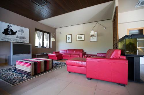 Koplietošanas atpūtas telpa ar TV, Sotto Il Cielo Hotel in Pignola