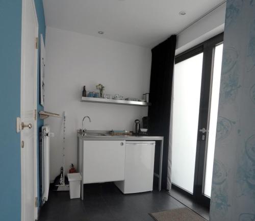 Toit ja joogid, Het blauwe huis in Beesel