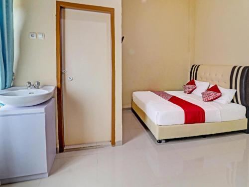 OYO 90945 Arizon Kost, Jambi